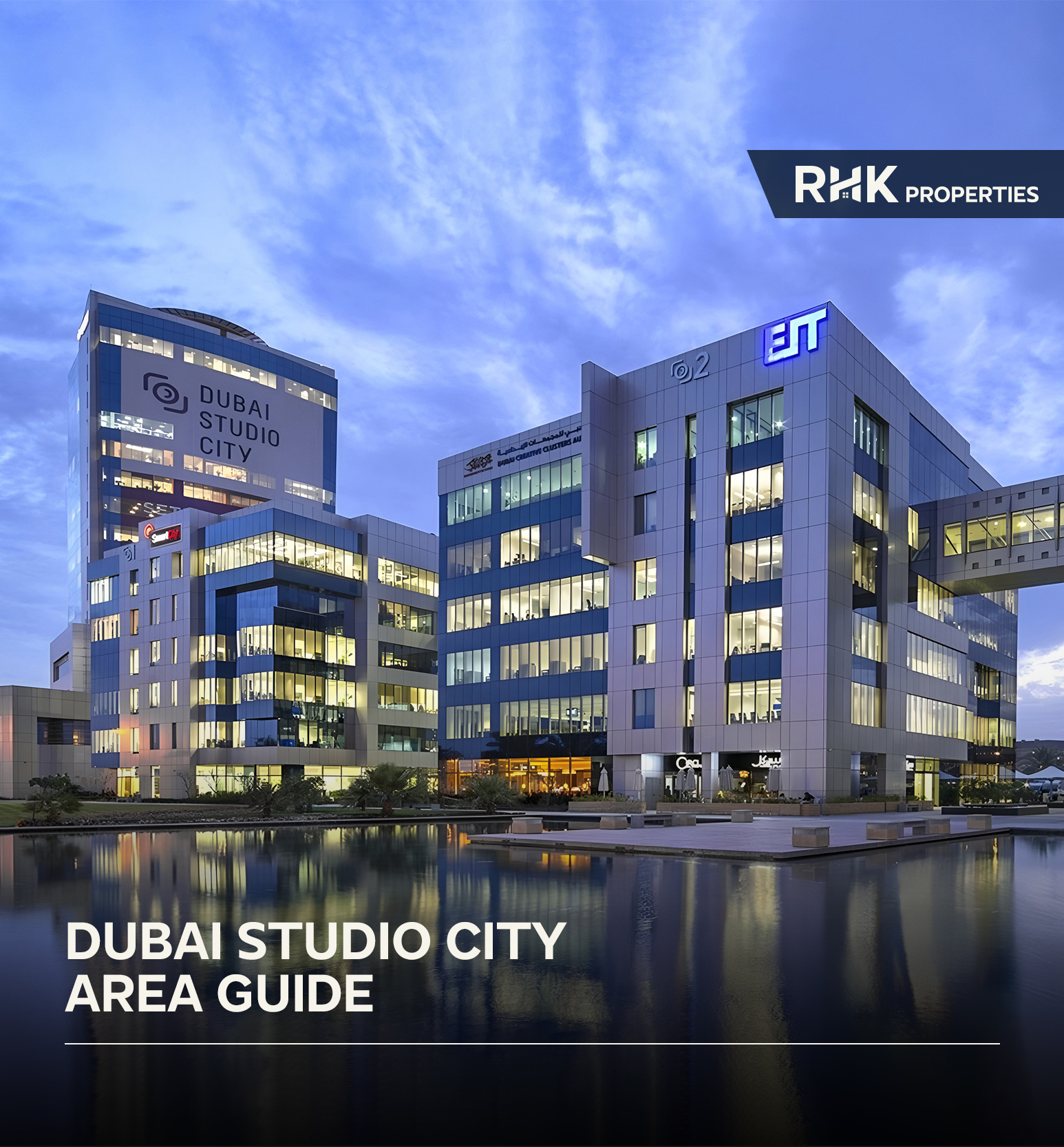 Dubai Studio City office complex with contemporary architecture and illuminated windows