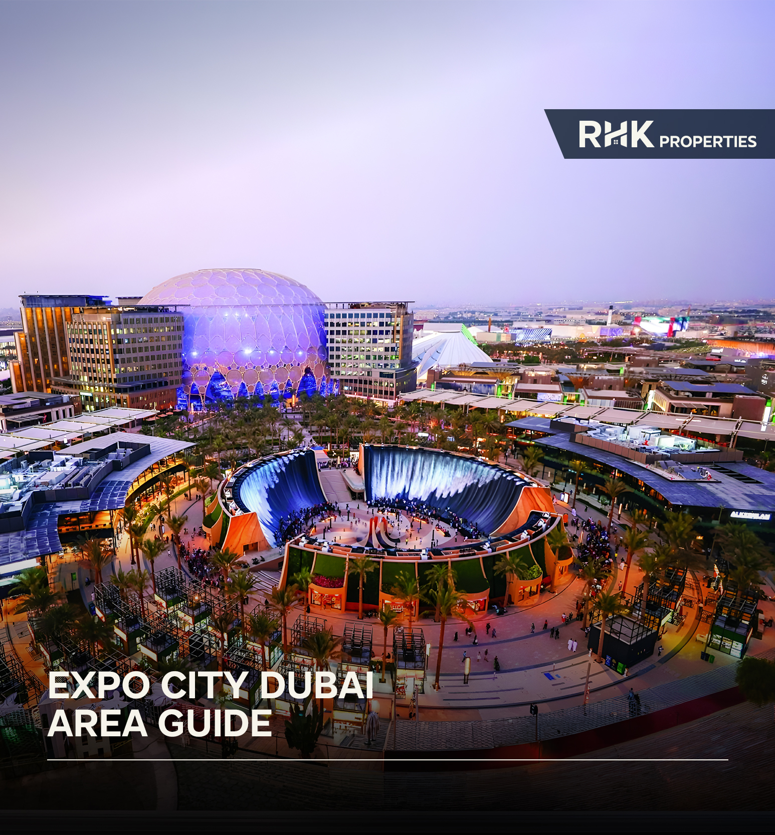 Night view of Expo City Dubai with illuminated Al Wasl Plaza and crowds