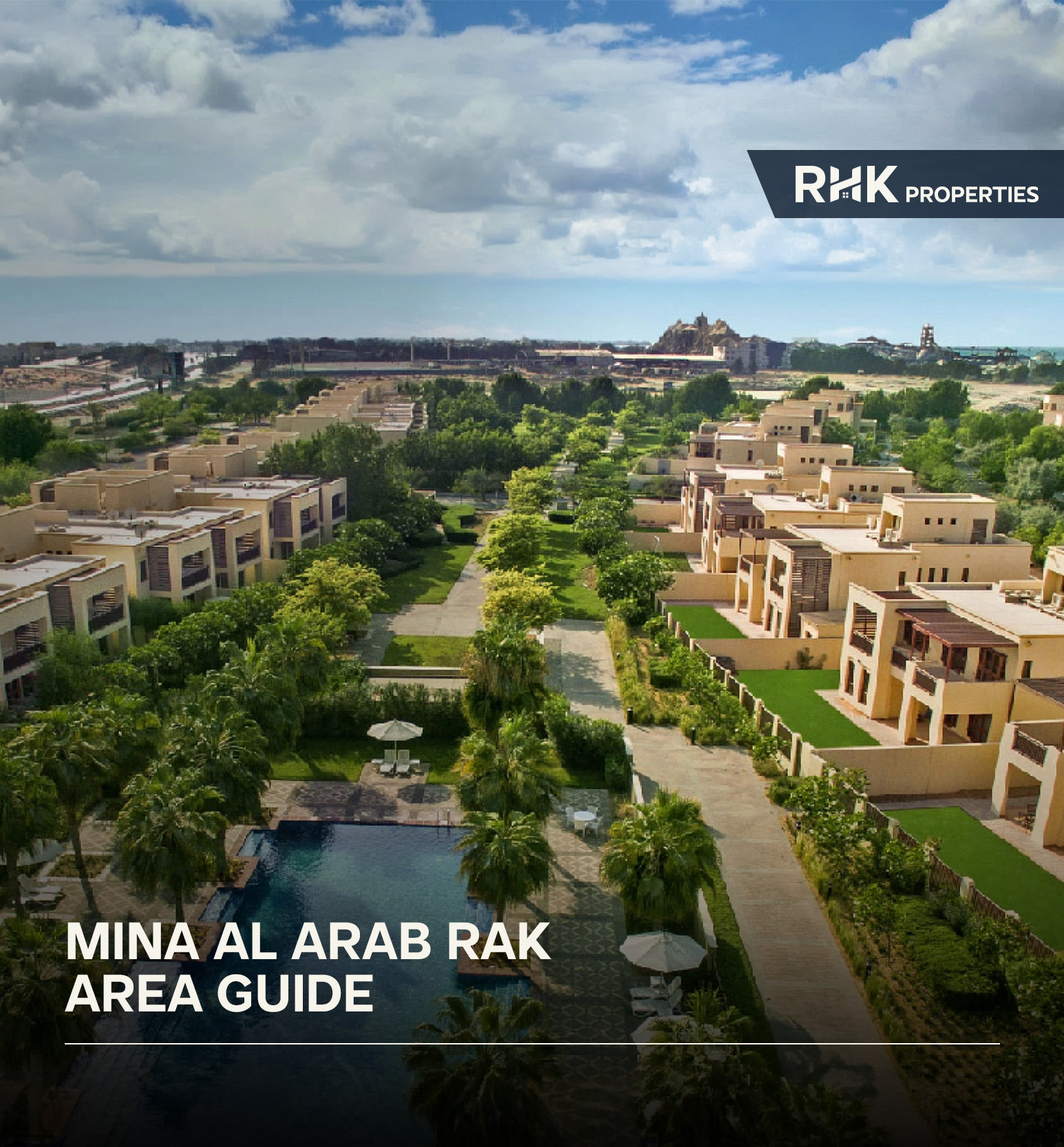 Landscaped villa community in Mina Al Arab featuring green spaces, pools, and waterfront surroundings.