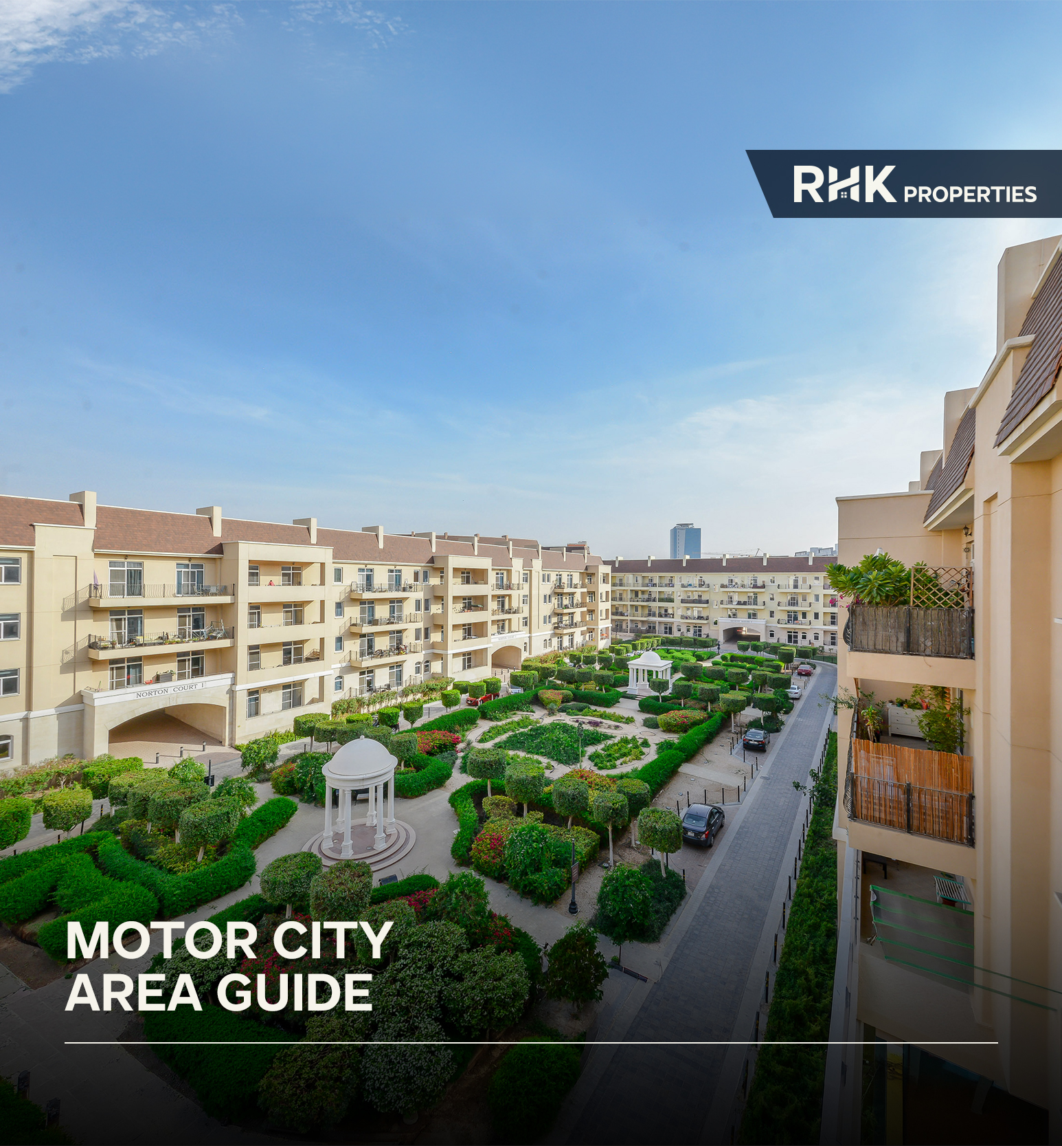 Tree-lined street in Motor City Dubai surrounded by modern apartment buildings and family-friendly amenities.