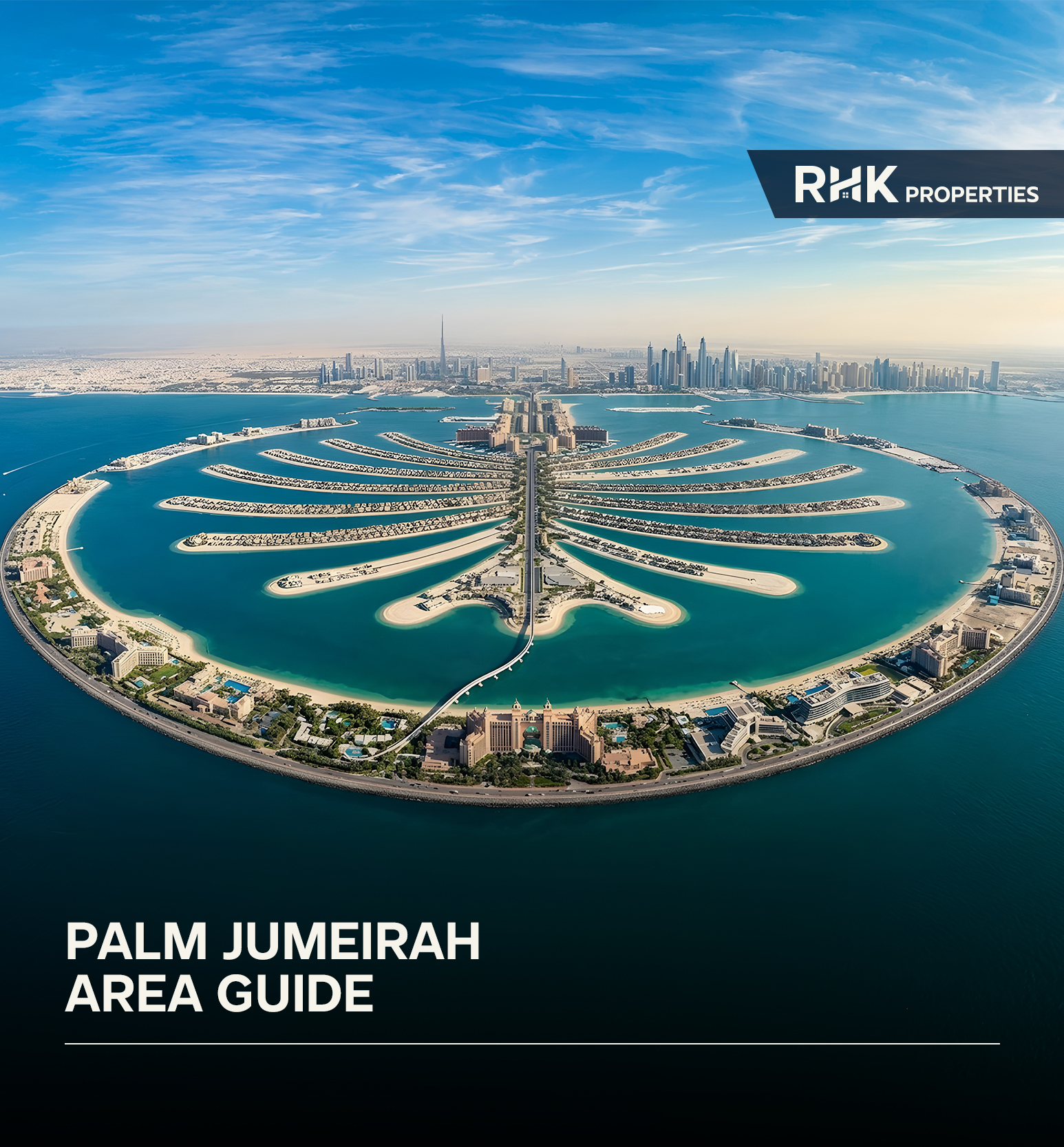 Aerial view of Palm Jumeirah showcasing its iconic palm-shaped design, luxury villas, and Dubai skyline backdrop.